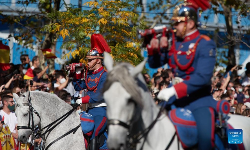 Soldiers attend a parade to celebrate the National Day of Spain in Madrid, Spain, Oct. 12, 2021. (Xinhua/Meng Dingbo)