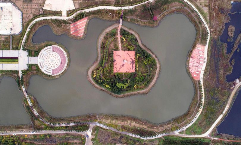 Aerial photo taken on Oct. 10, 2021 shows scenery of a wetland park in Huanghua City, north China's Hebei Province. In recent years, the coastal city of Huanghua has renovated abandoned pits, ponds and depressions with high degree of soil salinization, and built more than 80 parks and gardens. The urban ecological environment has been improved and citizens has more leisure space. (Xinhua/Luo Xuefeng)