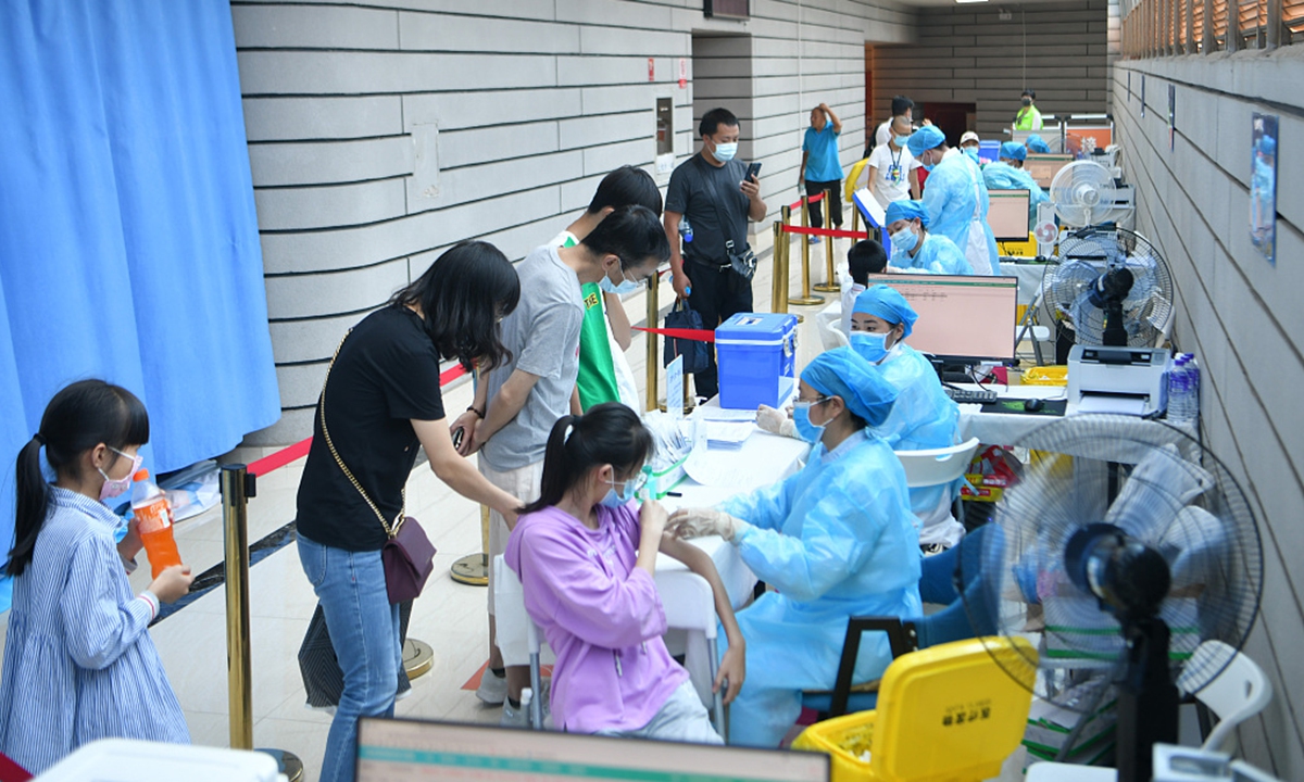 Teenagers get vaccinated in Kunming, capital city of Yunnan Province on August 3, 2021. Photo: CFP
