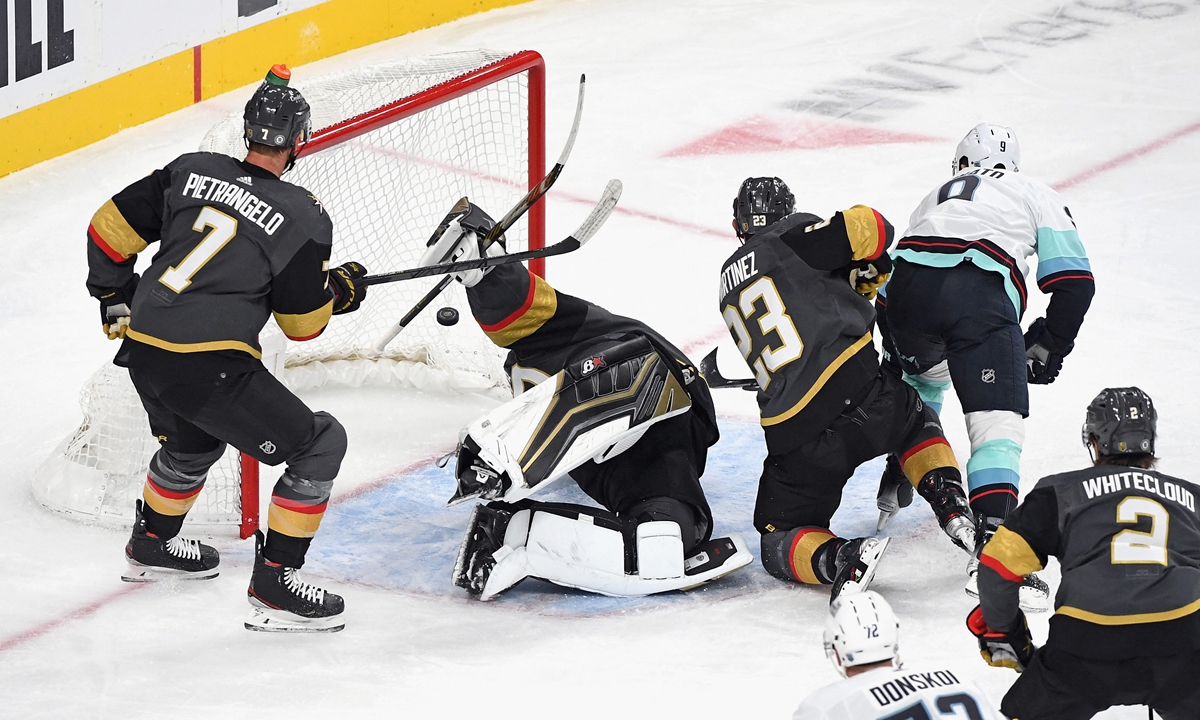 Ryan Donato (second from right) of the Seattle Kraken scores against the Vegas Golden Knights on Tuesday in Las Vegas, Nevada. Photo: AFP
