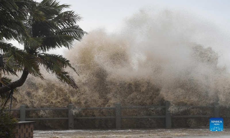 Huge waves lash the shore in Haikou, capital of south China's Hainan Province, Oct. 13, 2021. (Xinhua/Yang Guanyu)