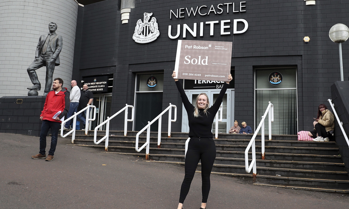 Newcastle United fans celebrate the sale of the club on October 7. Photo: VCG