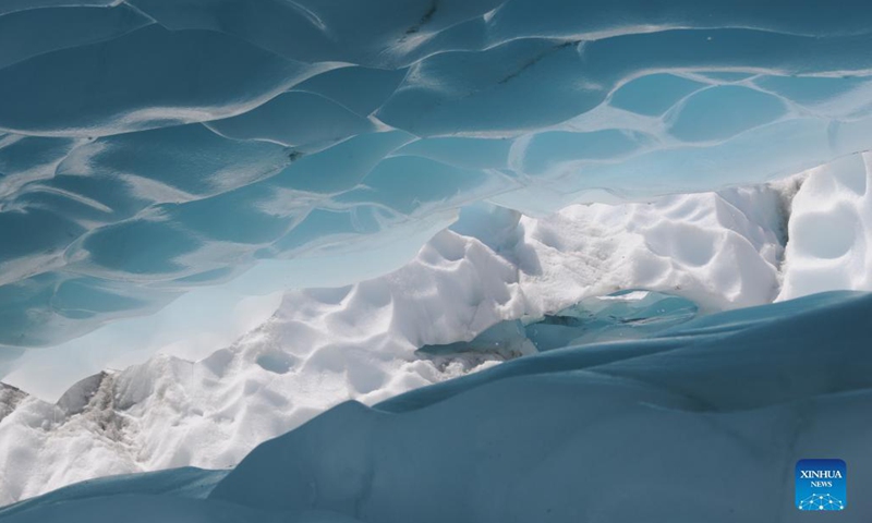 Photo taken on Oct. 13, 2021 shows a view of Fox Glacier on the west coast of New Zealand's South Island. Fox Glacier is one of the most accessible glaciers in the world. In the past decades, the glacier retreated significantly due to global climate change.(Photo: Xinhua)