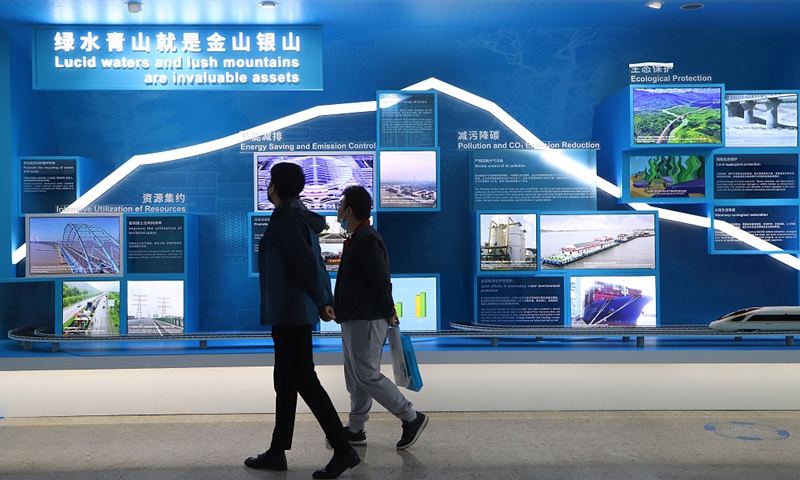 Visitors view an exhibition of the Second United Nations Global Sustainable Transport Conference Photo: CFP