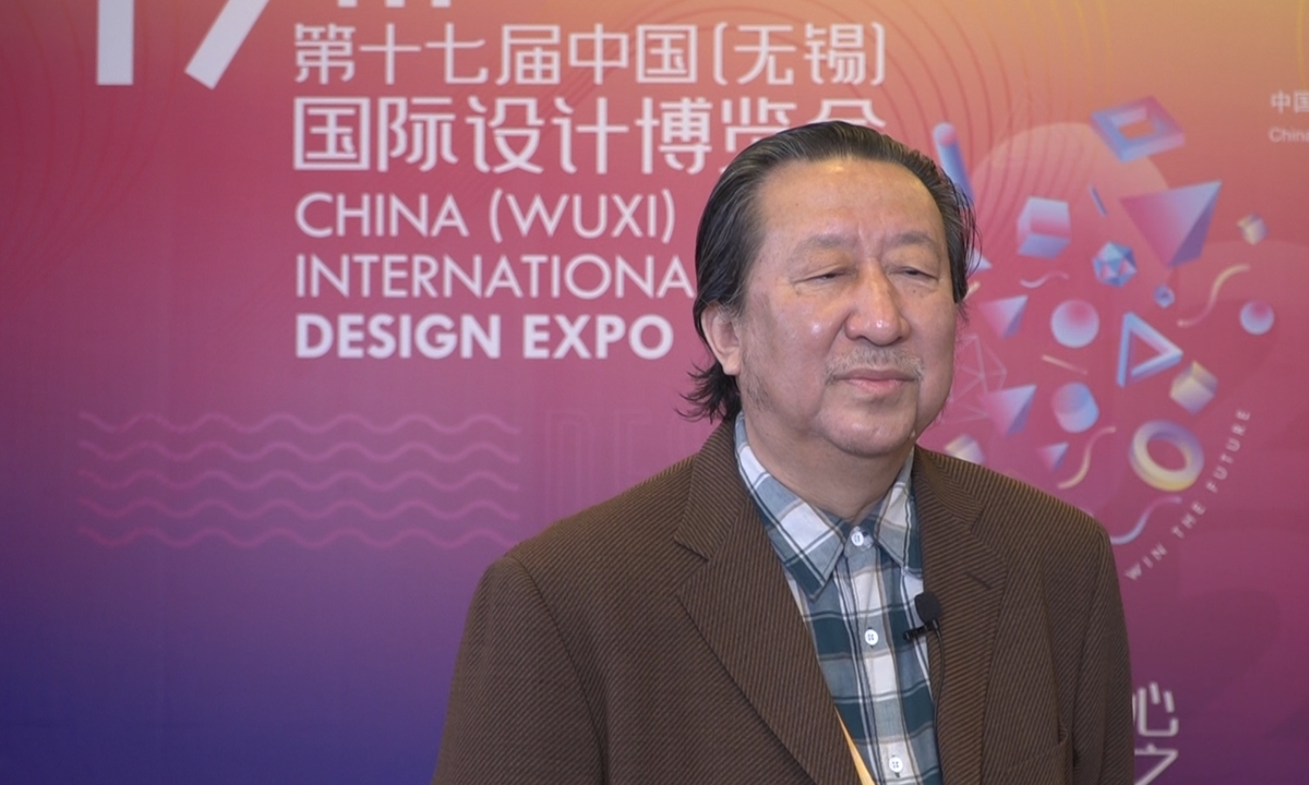 Yang Xiaoyang, vice chairman of the Chinese Artists Association, is being interviewed during The 17th China (Wuxi) International Design on Monday.  Photo: Courtesy of the Expo