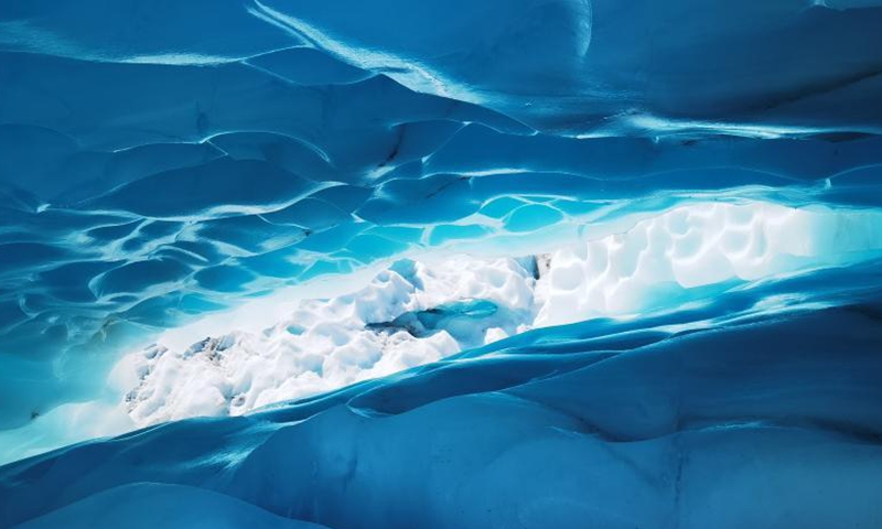 Photo taken on Oct. 13, 2021 shows a view of Fox Glacier on the west coast of New Zealand's South Island. Fox Glacier is one of the most accessible glaciers in the world. In the past decades, the glacier retreated significantly due to global climate change.(Photo: Xinhua)