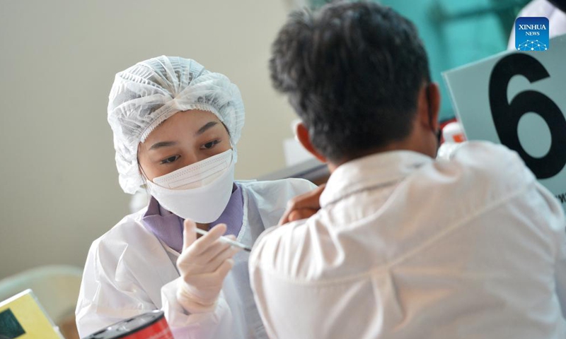 A citizen receives a dose of COVID-19 vaccine in Bangkok, Thailand, Oct. 13, 2021. Thailand on Thursday reported 11,276 new COVID-19 cases and 112 more fatalities in the last 24 hours, according to Thailand's Center for COVID-19 Situation Administration.Photo:Xinhua