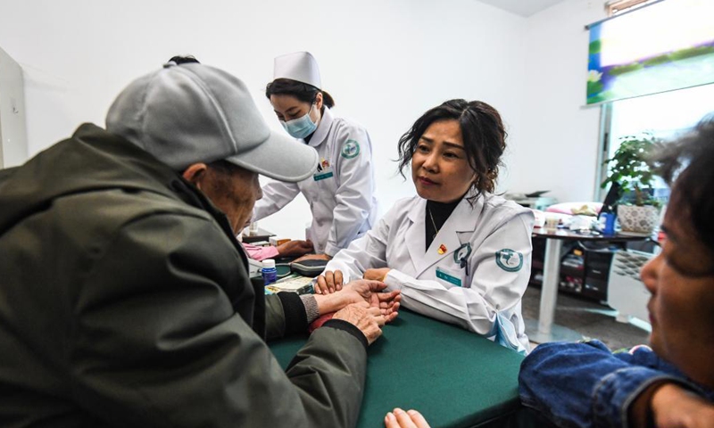 Medical workers provide free medical care service to the elders at a university for senior citizens of Zhongshan District in Liupanshui, southwest China's Guizhou Province, Oct. 14, 2021.Photo:Xinhua