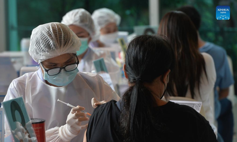 Citizens receive COVID-19 vaccines in Bangkok, Thailand, Oct. 13, 2021. Thailand on Thursday reported 11,276 new COVID-19 cases and 112 more fatalities in the last 24 hours, according to Thailand's Center for COVID-19 Situation Administration.Photo:Xinhua