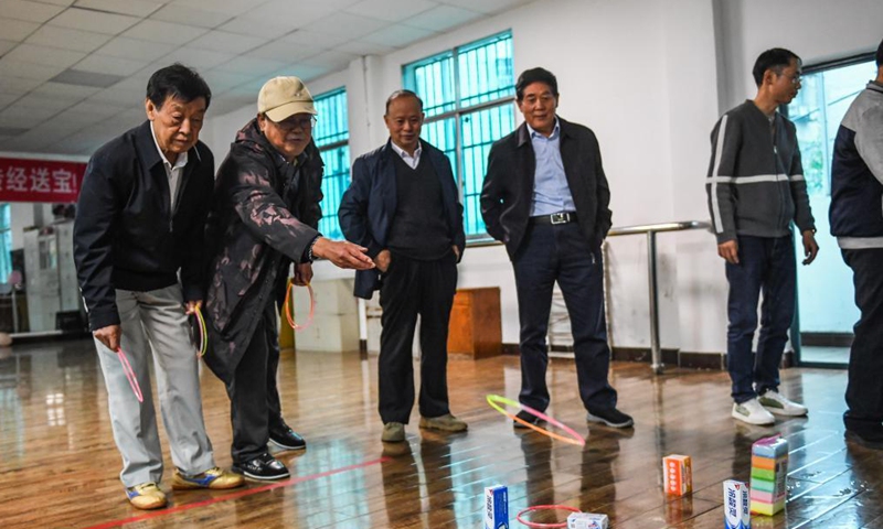 Elders play a game at a university for senior citizens of Zhongshan District in Liupanshui, southwest China's Guizhou Province, Oct. 14, 2021.Photo:Xinhua