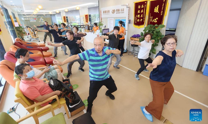 Elders exercise at a senior care center in Xuhui District of Shanghai, east China, Oct. 13, 2021.Photo:Xinhua