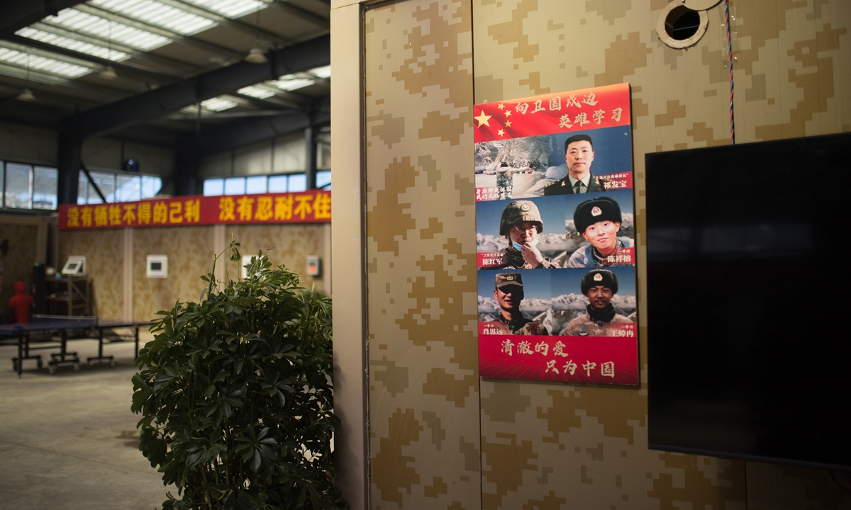 Photos of the fighting heroes from the Galwan Valley clash in June 2020 are posted on the wall inside a company barrack in Gamba. Photo: Shan Jie/GT
