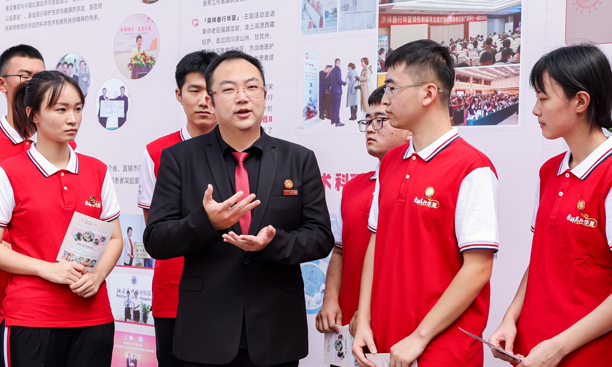 Kevin Xu attends a public service activity. Photo: Courtesy of MEBO 