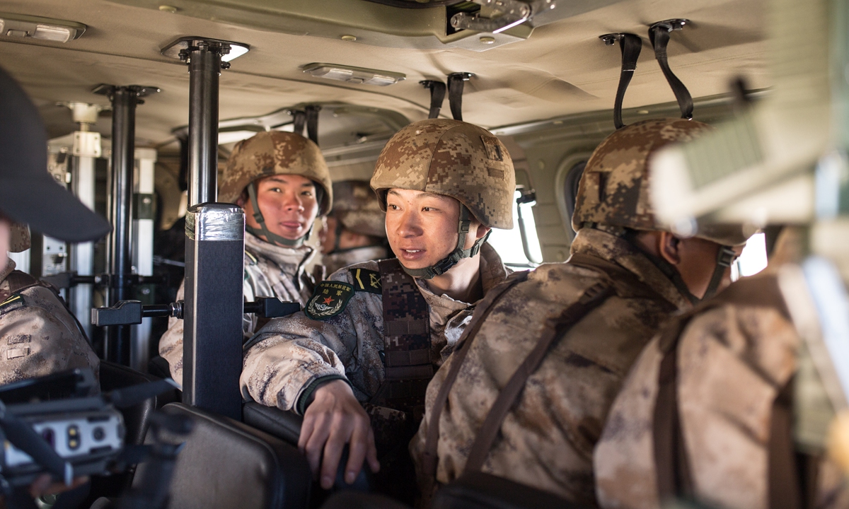 Soldiers from a patrol squad of the Gamba battalion in an assault vehicle. Photo: Shan Jie/GT

