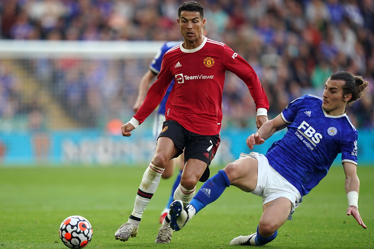 Manchester United's Cristiano Ronaldo (left) is tackled by Leicester City's Caglar Soyuncu on Saturday in Leicester, England.  Photo: VCG
