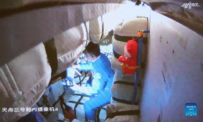Screen image captured at Beijing Aerospace Control Center in Beijing, capital of China, Oct. 17, 2021 shows the Shenzhou-13 crew entering the Tianzhou-3 cargo craft. The Shenzhou-13 crew has entered the Tianzhou-3 cargo craft to transfer the cargo, according to the China Manned Space Agency (CMSA) on Sunday.Photo: Xinhua