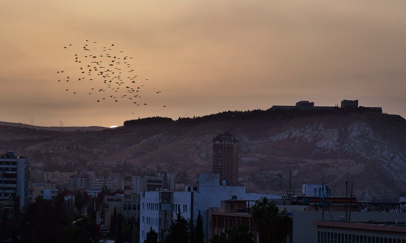 Photo taken on April 7, 2021 shows a view of sunset in Damascus, Syria.(Photo: Xinhua)