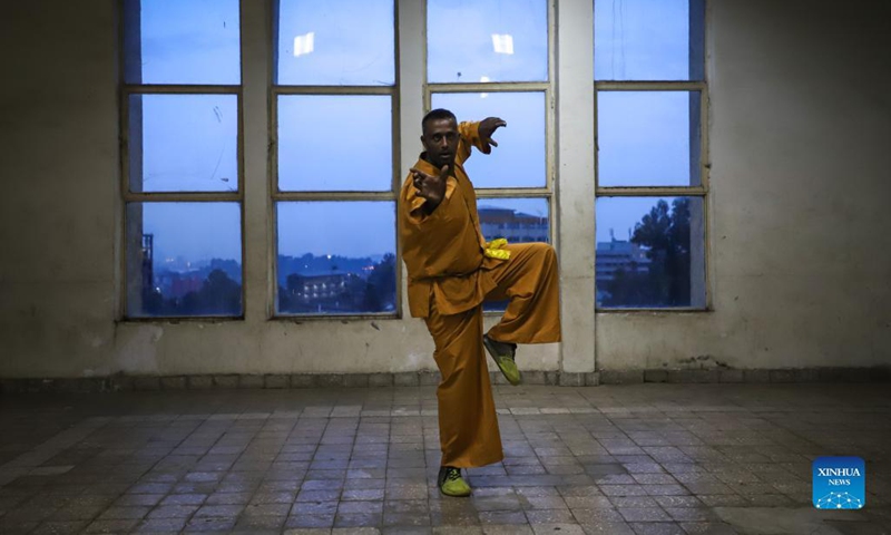 Master Dawit Terefe, who works as a coach in the training center, practices Chinese martial arts at Dave Dan Wushu and Kickboxing Training Center in Addis Ababa, Ethiopia, Sept.  29, 2021.(Photo: Xinhua)