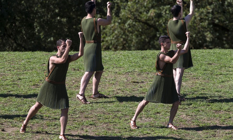 Actors perform during the Olympic flame lighting ceremony for the Beijing 2022 Olympic Winter Games, in Ancient Olympia, Greece, Oct. 18, 2021.(Photo: Xinhua)