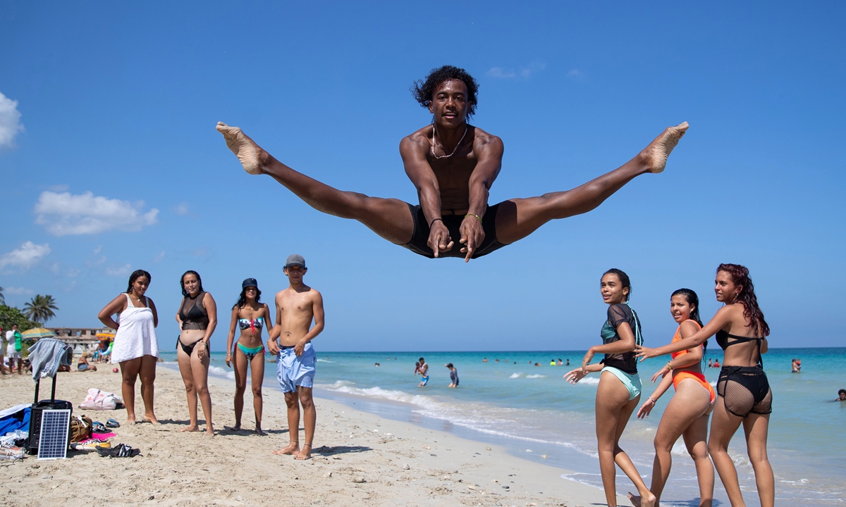 Several people enjoy a day at the beach in Havana, Cuba on October 6. Photo: IC