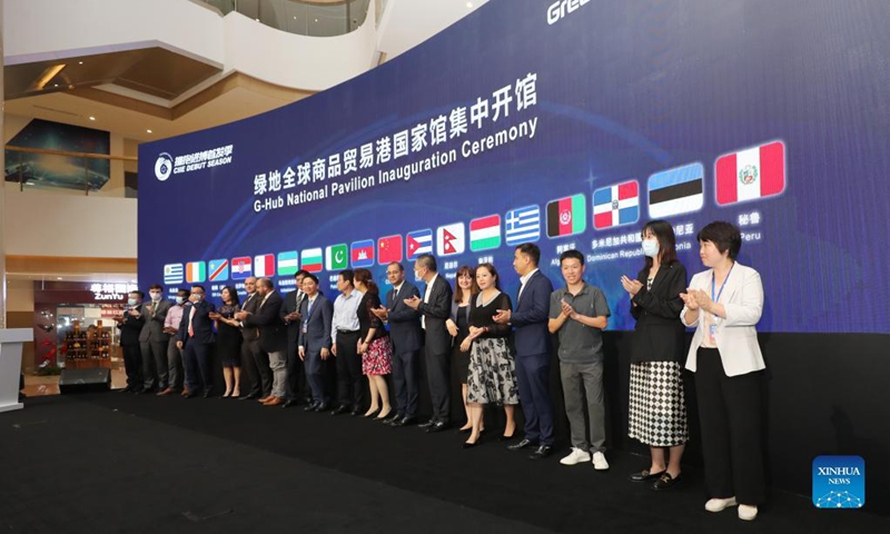 Ma Yuxia (1st R) attend an inauguration ceremony for national pavilions at the Greenland Global Commodity Trading Hub in Shanghai, east China, Oct. 15, 2021.Photo: Xinhua