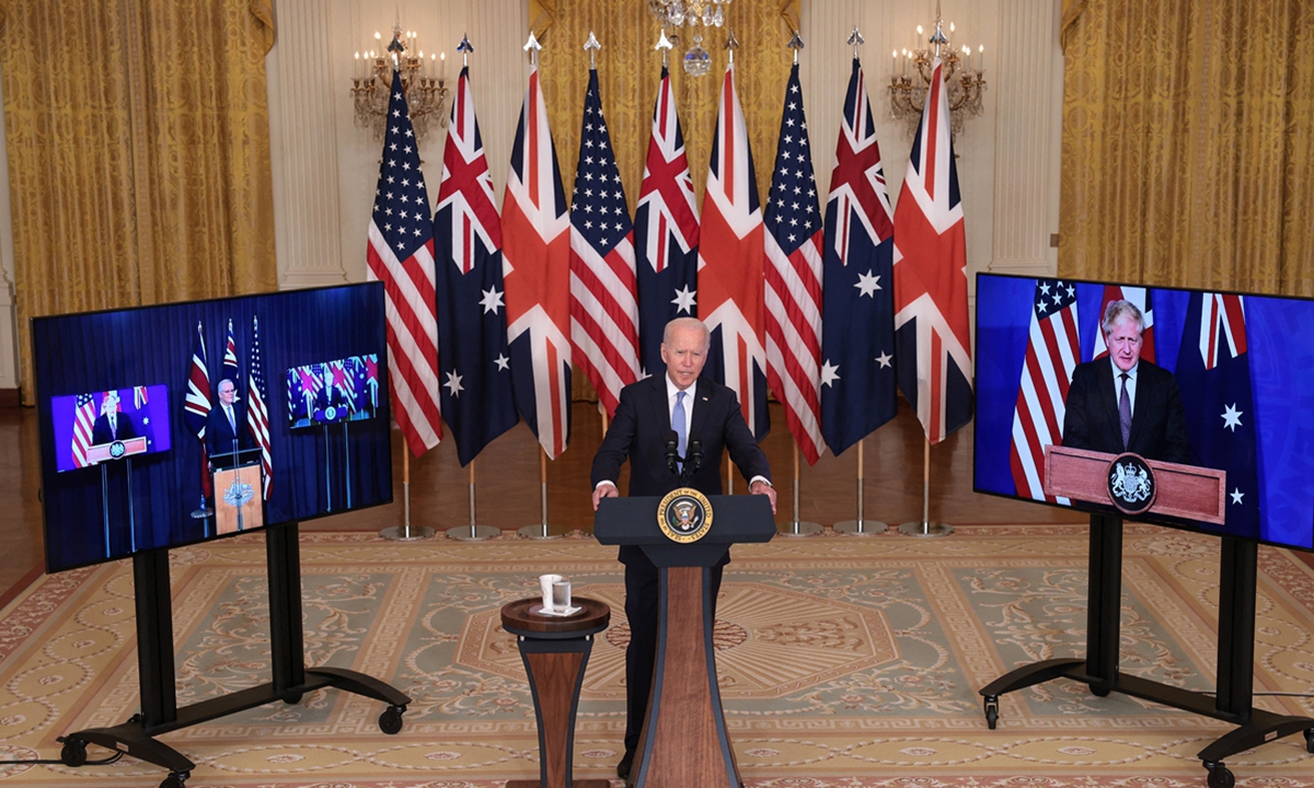 US President Joe Biden speaks during an event in the East Room of the White House on September 15 in Washington DC. Biden announced a new national security initiative in partnership with Australian Prime Minister Scott Morrison (L) and UK Prime Minister Boris Johnson (R). Photo: AFP