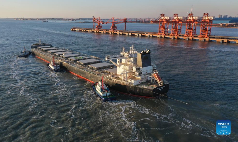 Aerial photo taken on Oct. 20, 2021 shows a bulk carrier berthing at ore wharf of Caofeidian Port in Tangshan, north China's Hebei Province. Photo: Xinhua