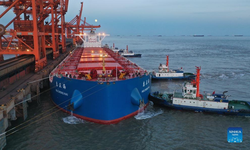 Aerial photo taken on Oct. 20, 2021 shows a bulk carrier berthing at ore wharf of Caofeidian Port in Tangshan, north China's Hebei Province. Photo: Xinhua
