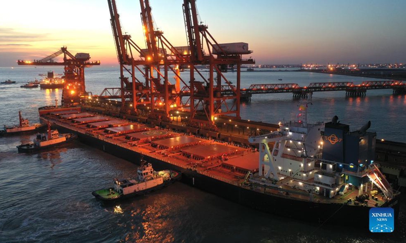 Aerial photo taken on Oct. 20, 2021 shows a bulk carrier berthing at ore wharf of Caofeidian Port in Tangshan, north China's Hebei Province. Photo: Xinhua