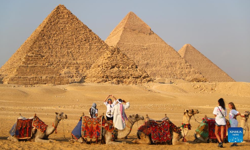 Tourists visit the Giza Pyramids in Giza, Egypt, on Oct. 21, 2021.Photo:Xinhua
