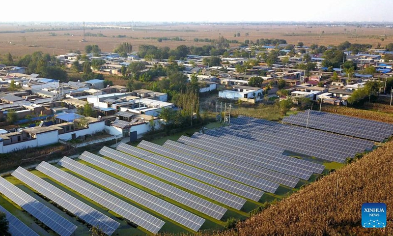 Aerial photo taken on Oct. 21, 2021 shows a photovoltaic power station in Liuqiukou Village of Xinhe County in north China's Hebei Province. Xinhe County boosts rural vitalization by developing distinctive agricultural products, improving living environment and elevating governance capability.Photo:Xinhua