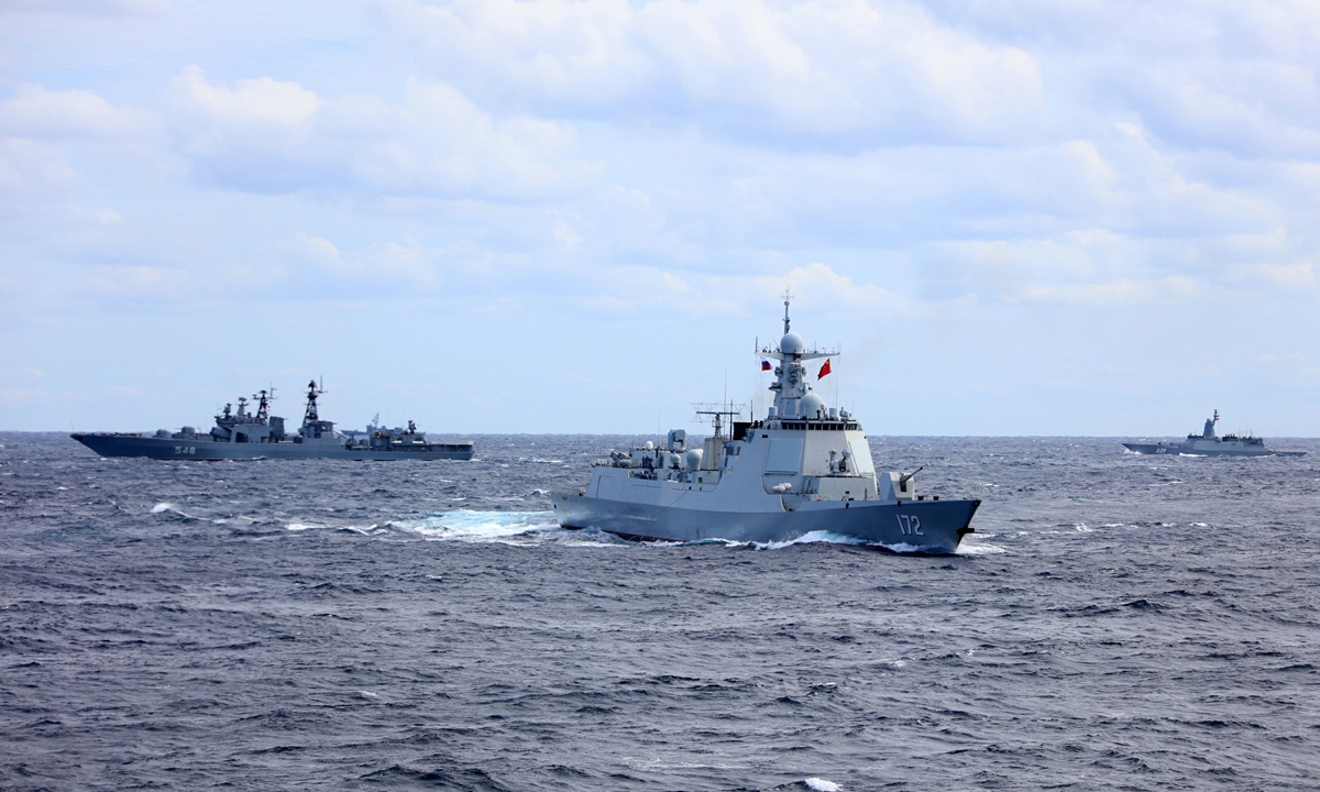 A China-Russia joint naval ships formation sails in the East China Sea on October 23, 2021. Photo: Li Tang