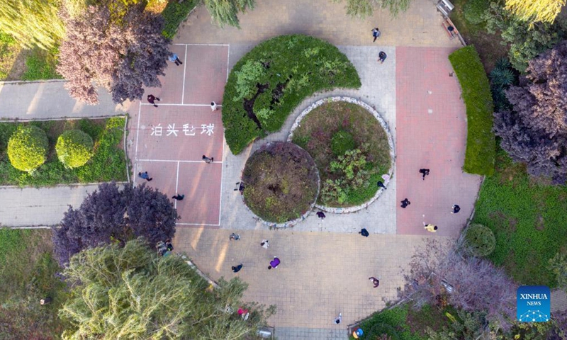 Aerial photo taken on Oct. 23, 2021 shows citizens visiting the Grand Canal landscape belt of Botou City, north China's Hebei Province. In recent years, Botou city has focused on restoring the natural ecology of the Grand Canal and creating a beautiful and comfortable leisure space for the public. (Photo:Xinhua)