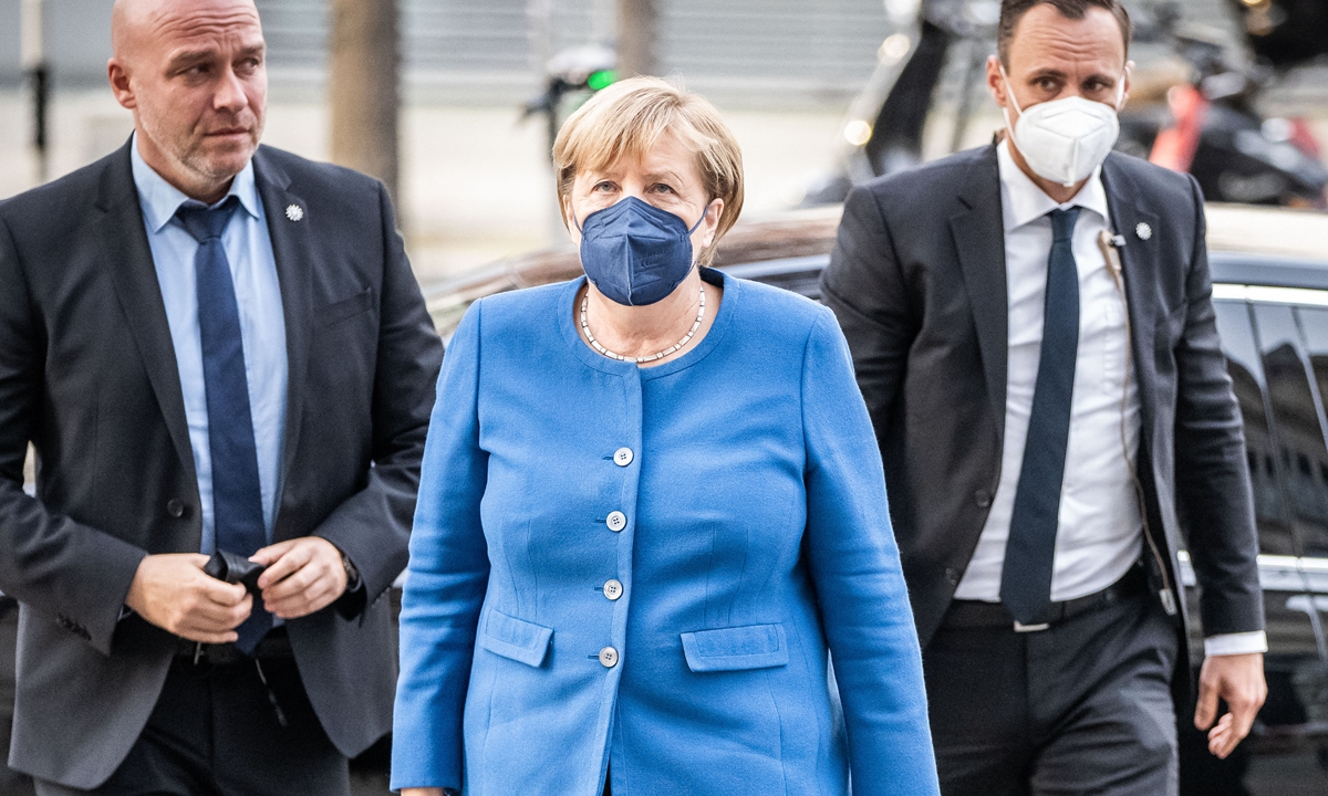 German Chancellor Angela Merkel (CDU) arrives on October 25, 2021 for her last meeting of the CDU/CSU parliamentary group before the constituent session. In the constituent session, the newly elected Bundestag meets for the first time on October 26. Photo: AFP