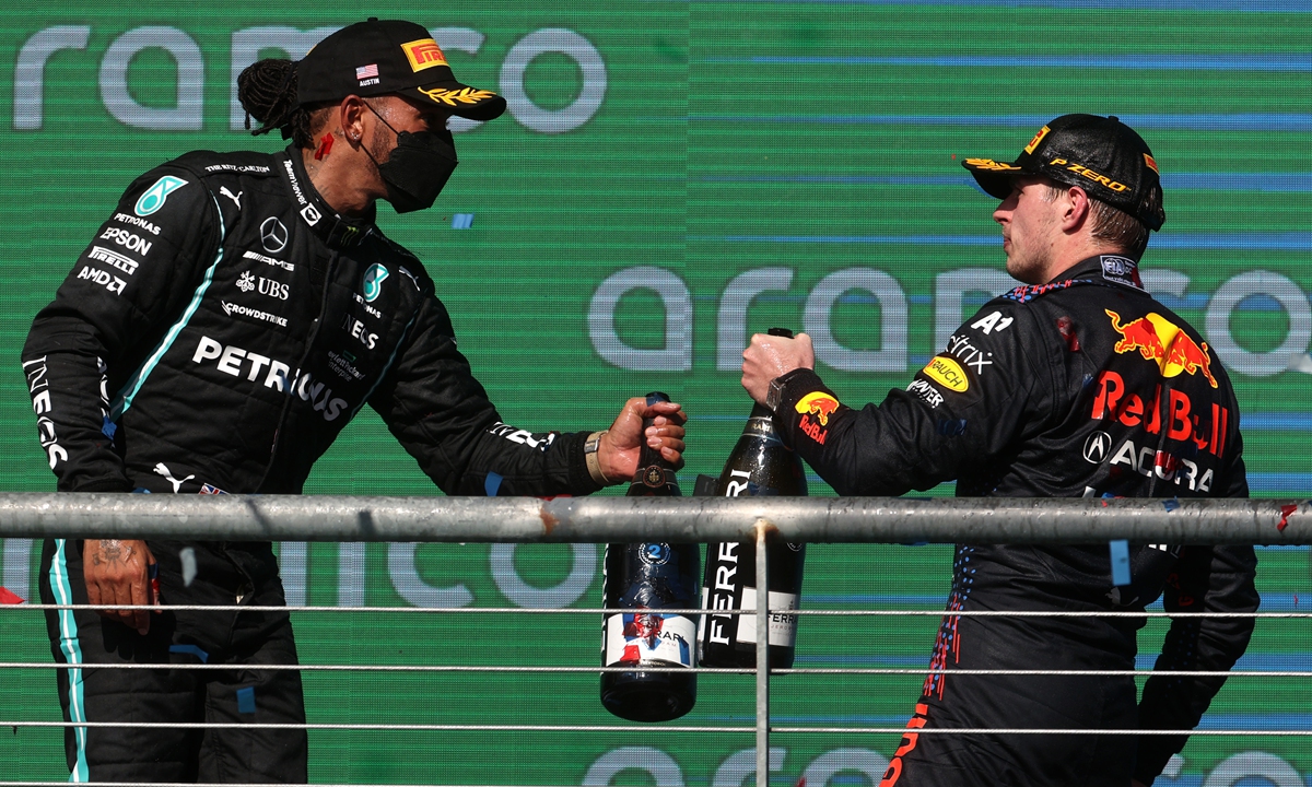Verstappen holds off Hamilton Global Times