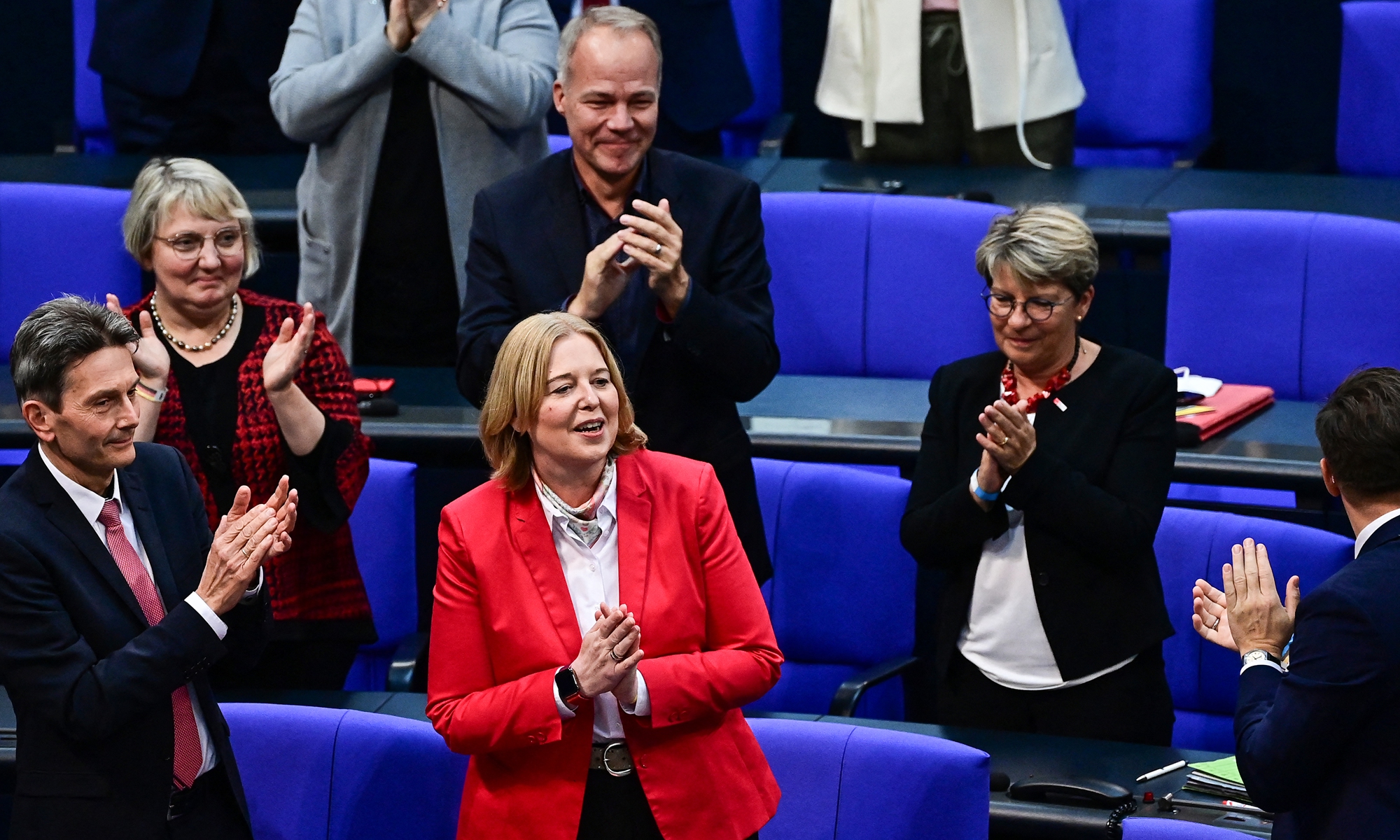 Baerbel Bas (front center) is applauded after being elected as new president of the Bundestag (lower house of parliament) on October 26, 2021, during a constituent session of Germany's new parliament at the Bundestag in Berlin. Delegates of the Bundestag will sit for the first time following the September elections, ushering in a post-Merkel era that is more female, younger and more ethnically diverse Photo: AFP