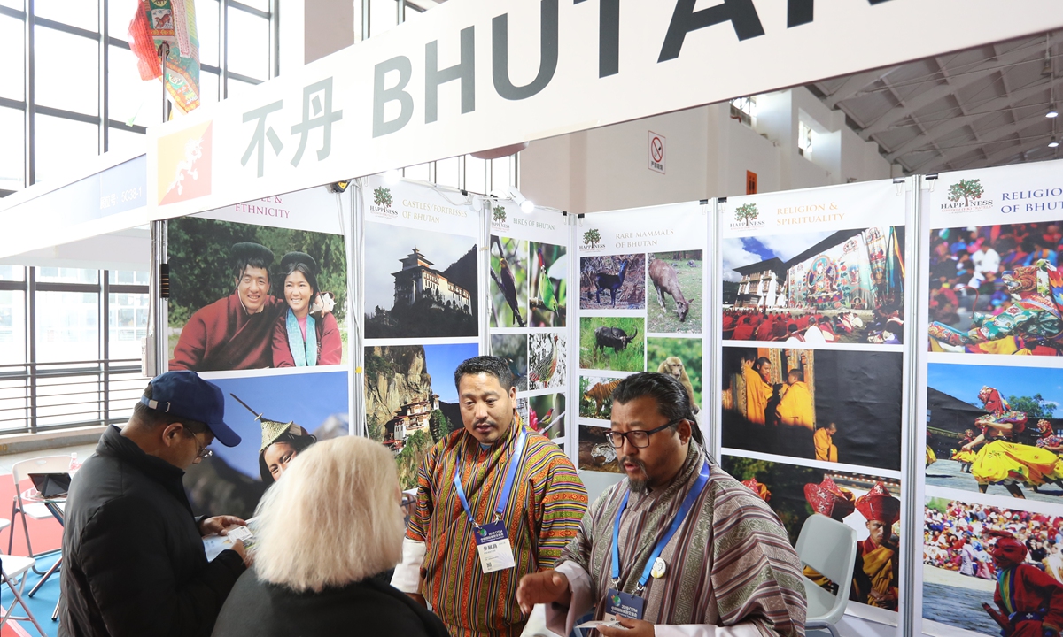 Visitors make inquiries at the Bhutan stand at the China International Travel Mart in Kunming, Southwest China's Yunnan Province, on November 15, 2019. Photo: VCG