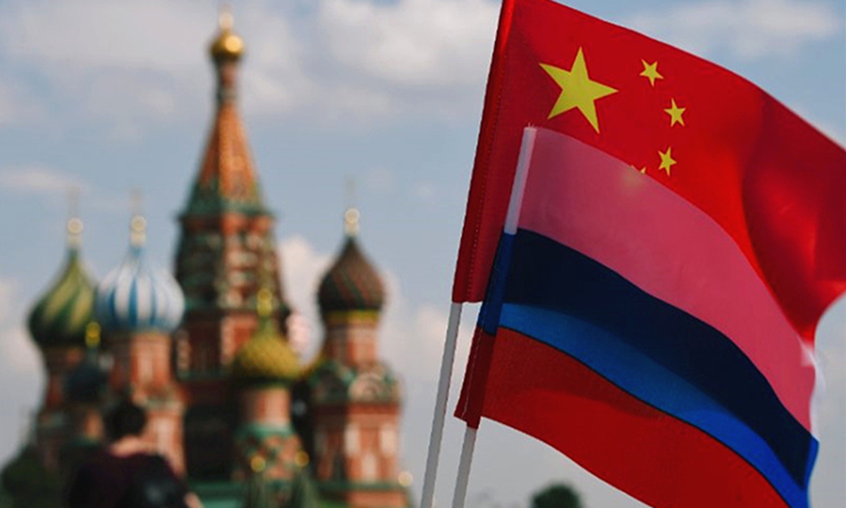 The national flags of China and Russia are seen on Red Square, Moscow. Photo: Xinhua