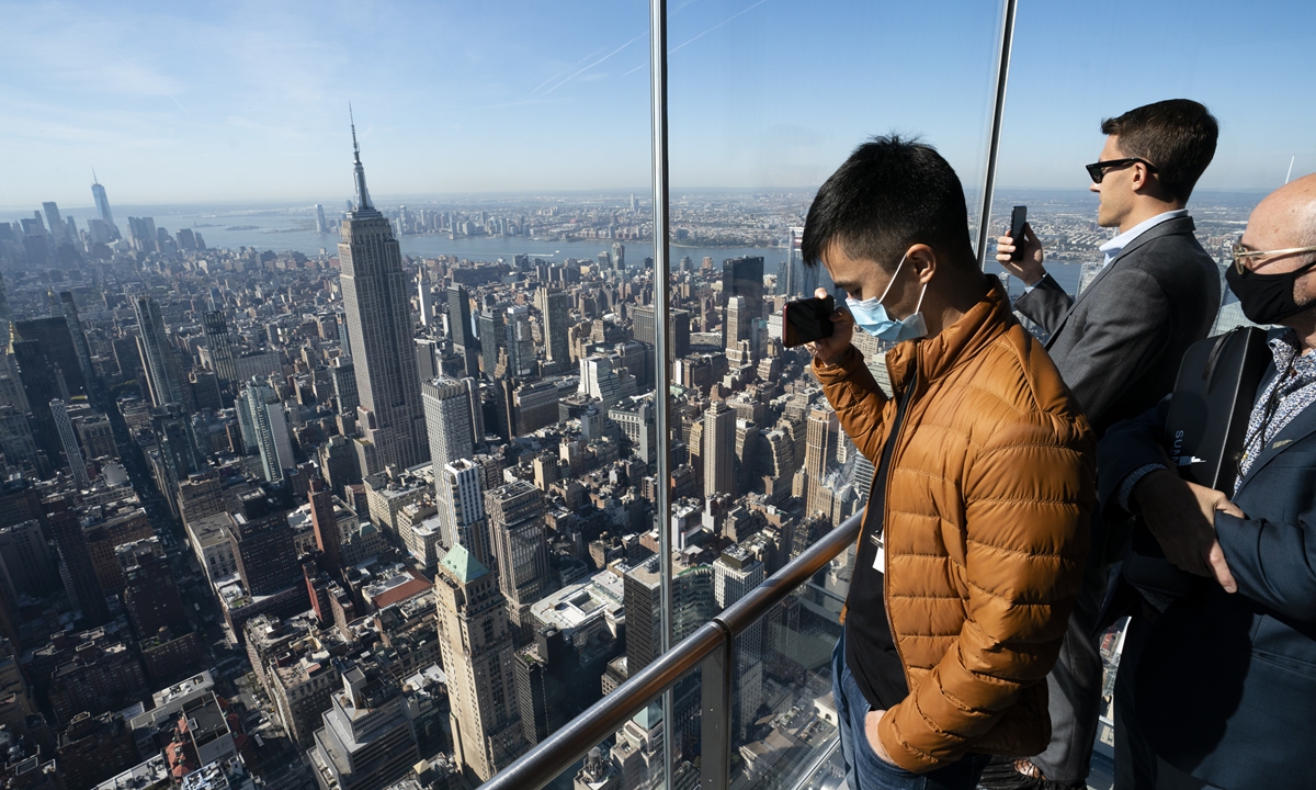 Tourists ride up an elevator to the highest publicly accessible height at the grand opening of SUMMIT One Vanderbilt, a skyscraper observatory on Manhattan's iconic 42nd Street on October 21.  Photo: VCG