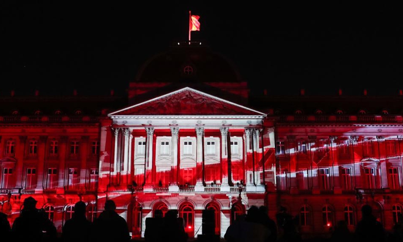 People watch a sound and light show at the Royal Palace in Brussels, Belgium, on Oct. 28, 2021. The ten-day event Bright Brussels, the festival of lights in Brussels, started on Thursday.Photo:Xinhua