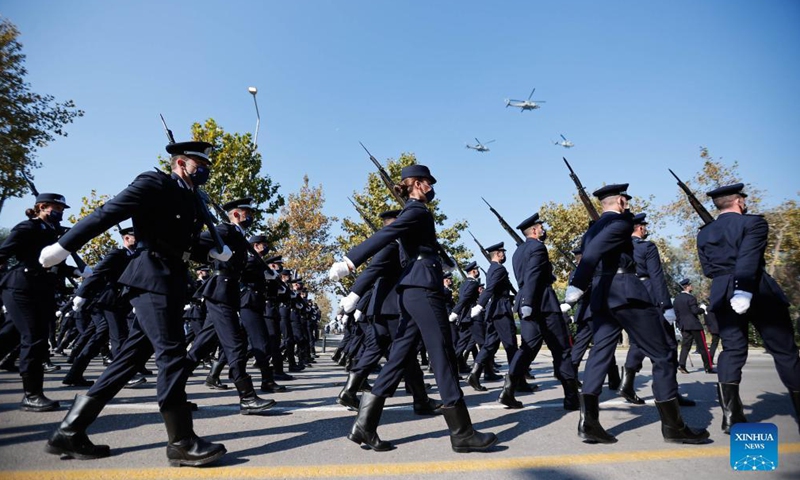 Police march during a military parade in Thessaloniki, northern Greece, on Oct. 28, 2021. Amid COVID-19 restrictions especially in the northern part of the country, Greece celebrated the annual Ochi (No) Day on Thursday with military and student parades.Photo:Xinhua