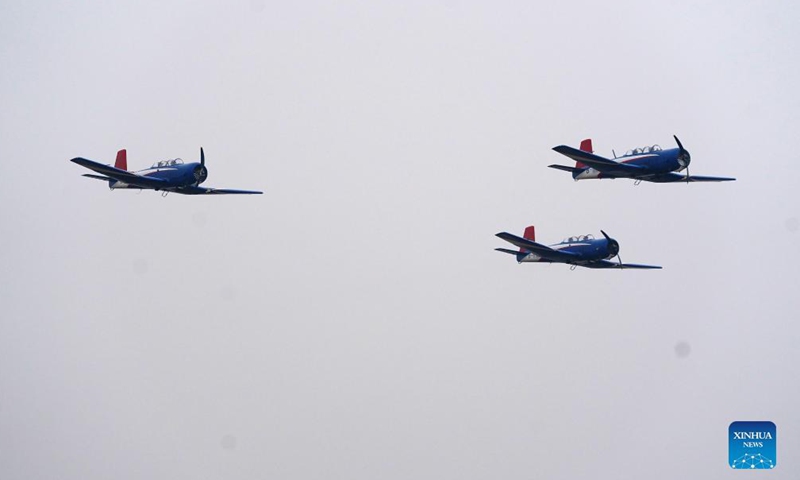 Red Star aerobatic team performs during the 2021 Nanchang Flight Convention at Yaohu Airport in Nanchang, capital of east China's Jiangxi Province, Oct. 29, 2021. The 2021 Nanchang Flight Convention is held here from Oct. 29 to 31.Photo:Xinhua