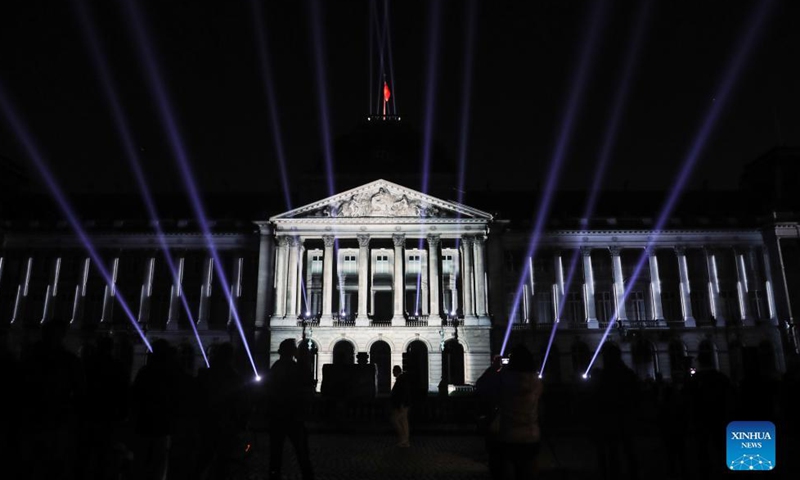 People watch a sound and light show at the Royal Palace in Brussels, Belgium, on Oct. 28, 2021. The ten-day event Bright Brussels, the festival of lights in Brussels, started on Thursday.Photo:Xinhua