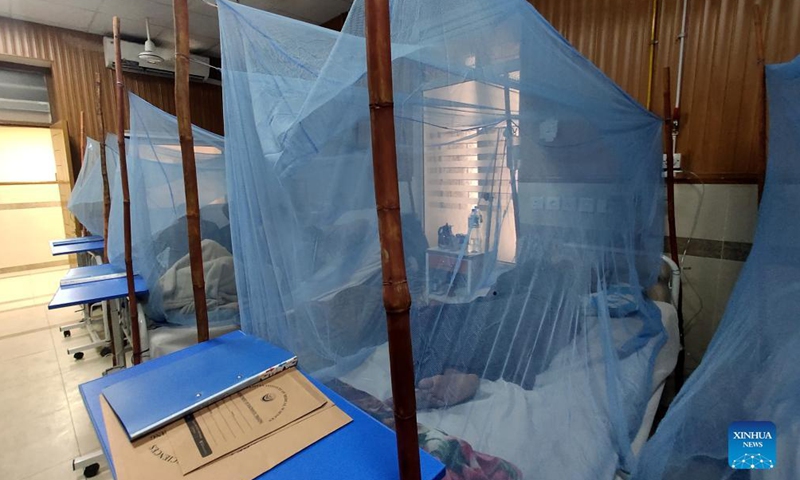 Patients affected with dengue fever are treated inside mosquito nets at a hospital in Islamabad, capital of Pakistan, Oct. 28, 2021.Photo:Xinhua