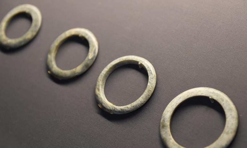 Photo taken on Oct. 29, 2021 shows jade rings excavated at Liangjiatan relics site, at Hanshan Museum in Hanshan County, east China's Anhui Province.Photo:Xinhua