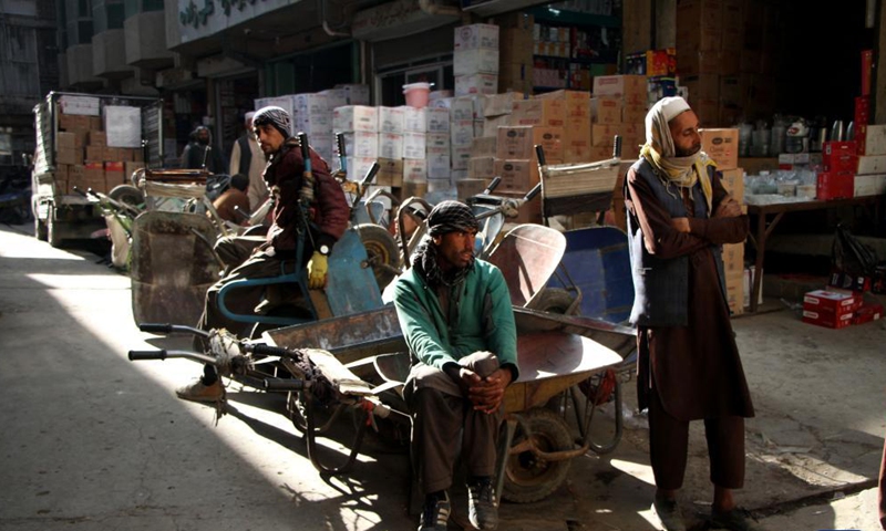 Residents wait to be hired at a market in Kabul, Afghanistan on October 28, 2021.Photo:Xinhua