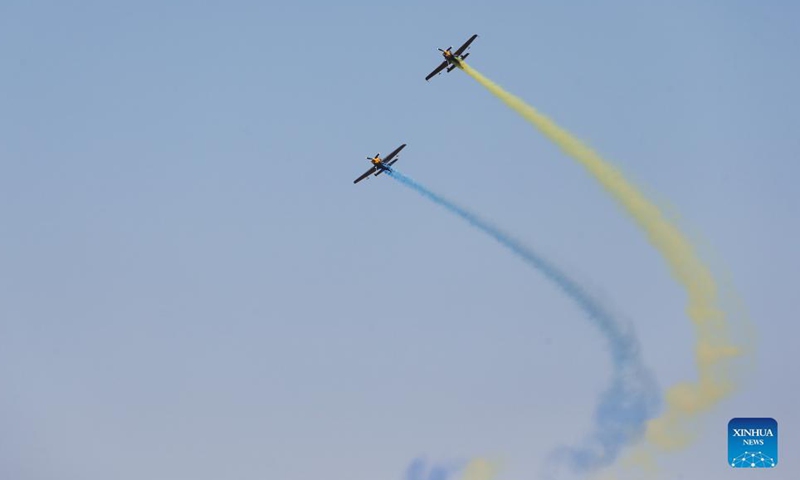 Aircrafts give aerobatic performance at a public event hosted by the China Aircraft Owners and Pilots Association (AOPA-China) in Anyang City of central China's Henan Province, Oct. 30, 2021.Photo:Xinhua