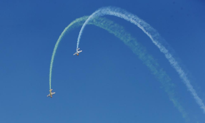 Aircrafts give aerobatic performance at a public event hosted by the China Aircraft Owners and Pilots Association (AOPA-China) in Anyang City of central China's Henan Province, Oct. 30, 2021.Photo:Xinhua