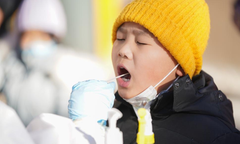 A resident receives nucleic acid test at a testing site in Heihe, northeast China's Heilongjiang Province, Oct. 31, 2021.Photo:Xinhua