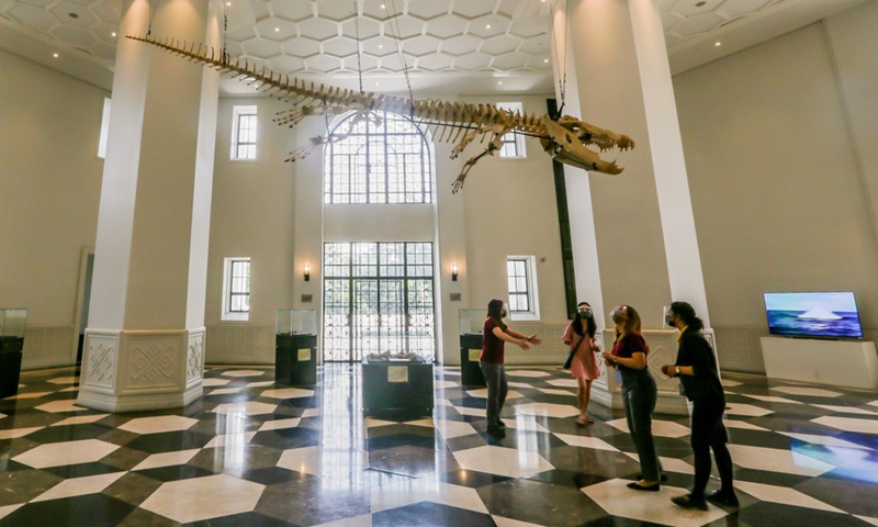Visitors listen to a guide as they visit the Philippine National Museum in Manila, the Philippines on Oct. 19, 2021.(Photo: Xinhua)